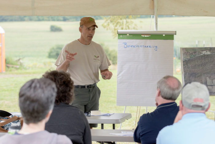 John Lemondes leading a discussion among farmer veterans. (Photo © James Bemus.)