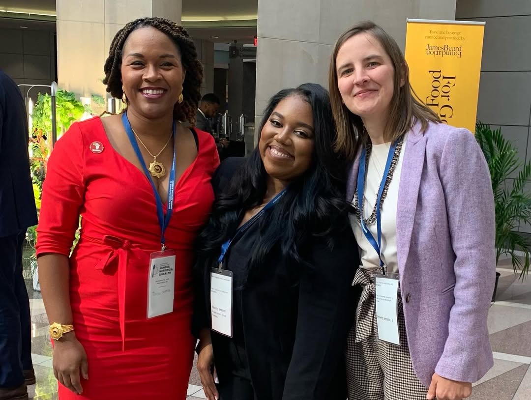 Tambra Stevenson (left) with Mary Blackford (center), owner of Market 7 food 一分钟赛车官方开奖查询结果 hall in D.C.’s Ward 7, and Ona Balkus, former D.C. food 一分钟赛车官方开奖查询结果 Policy Director, at the White House Conference on Hunger, Nutrition, and Health in 2022.